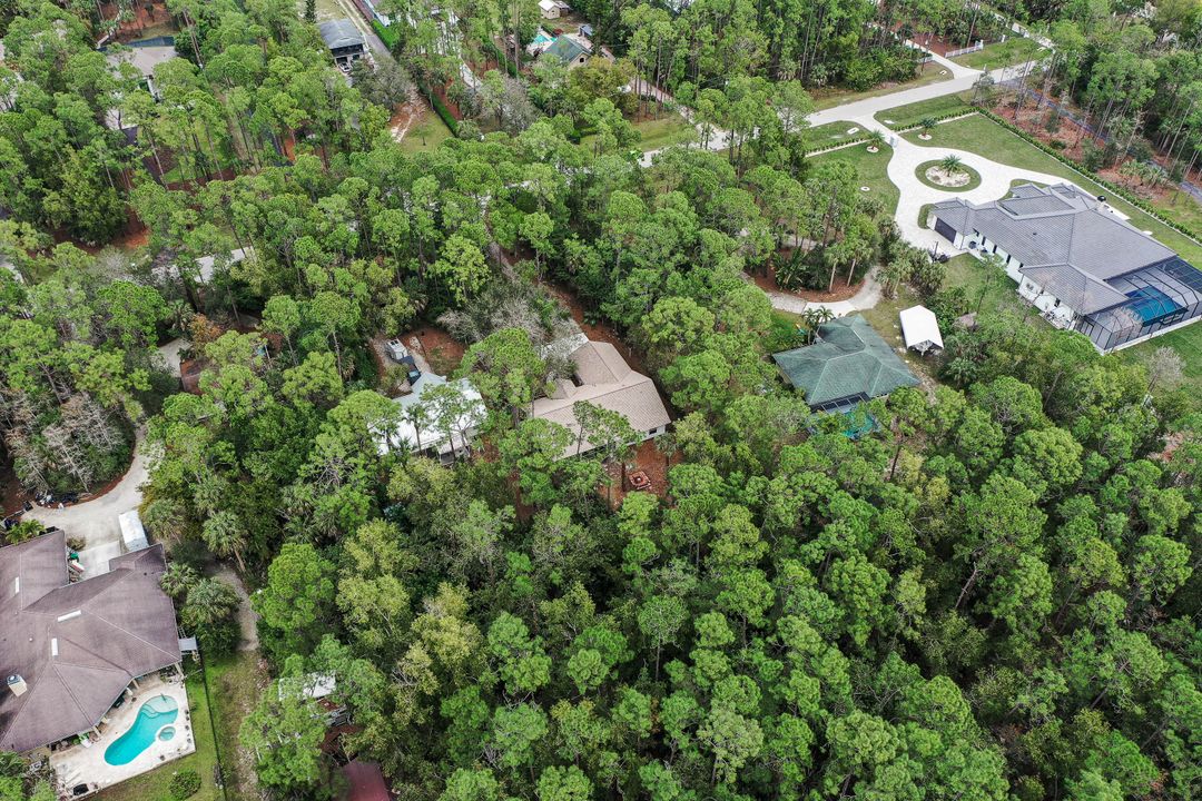 6030 English Oaks Ln, Naples, FL 34119