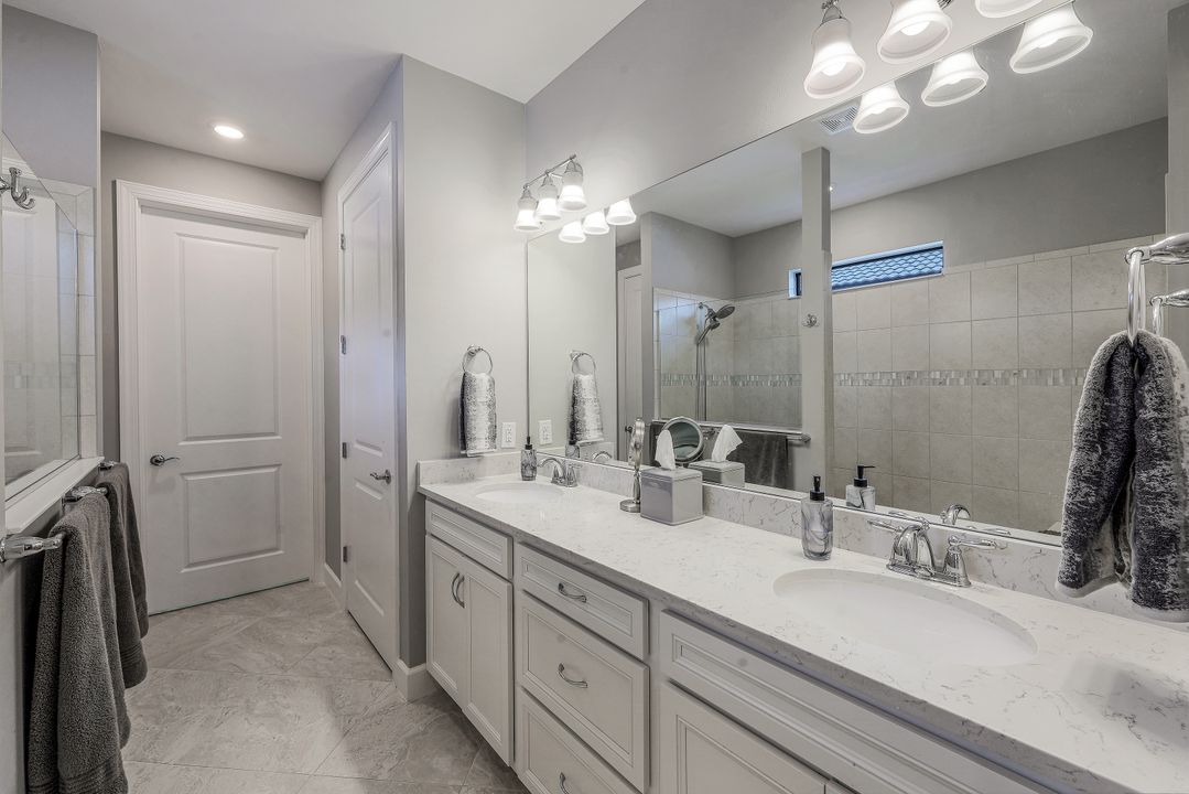 7692 Winding Cypress Dr, Naples, FL 34114