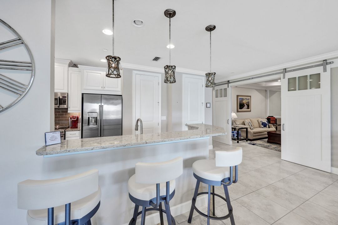 8772 Bellano Ct  #104, Naples, FL 34119