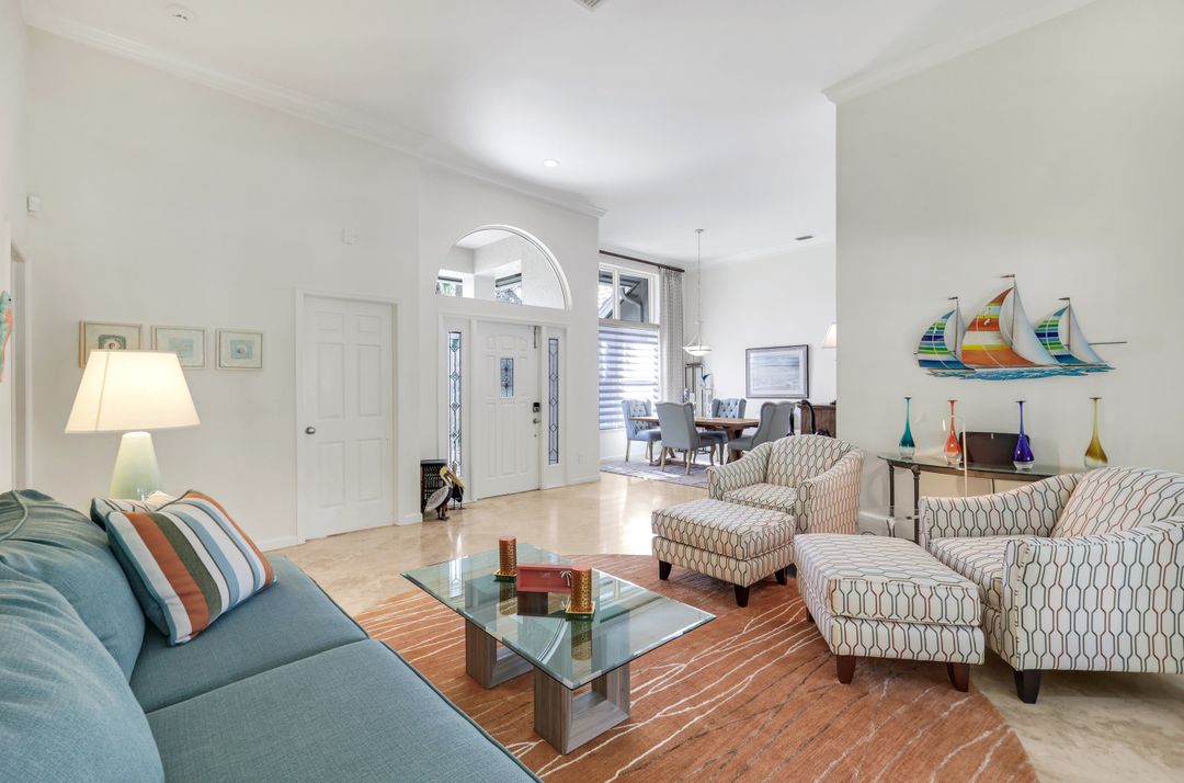 717 Pine Creek Ln, Naples, FL 34108