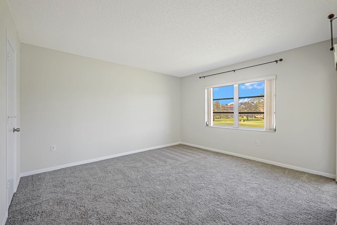 201 Quail Forest Blvd #202, Naples, FL 34105