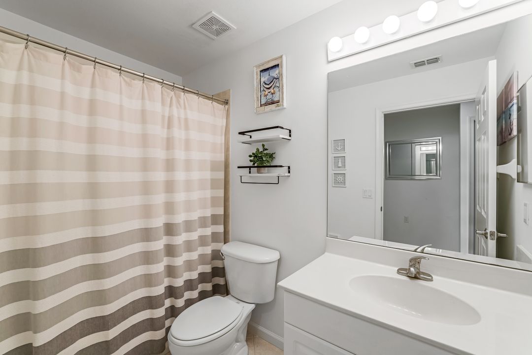 9231 Palmetto Ridge Dr #102, Estero, FL 34135