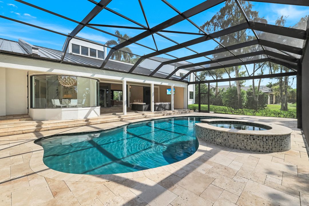 13087 Pond Apple Dr E, Naples, FL 34119