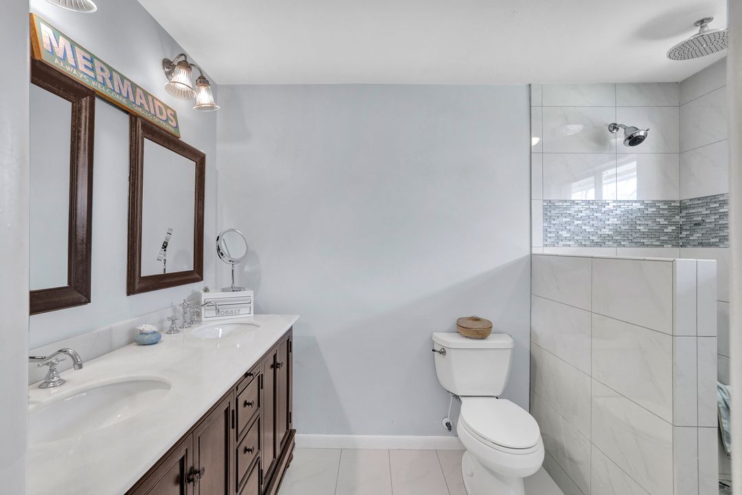 208 Baltusrol Dr, Naples, FL 34113