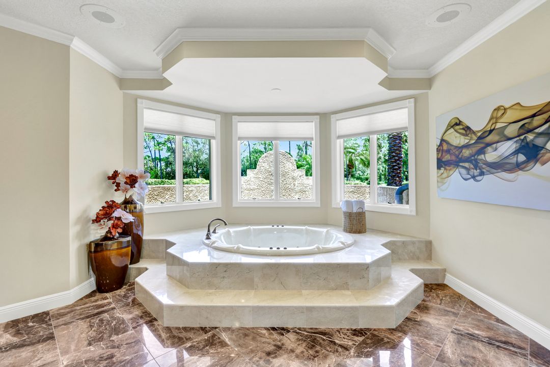 13488 Pond Apple Dr W, Naples, FL 34119