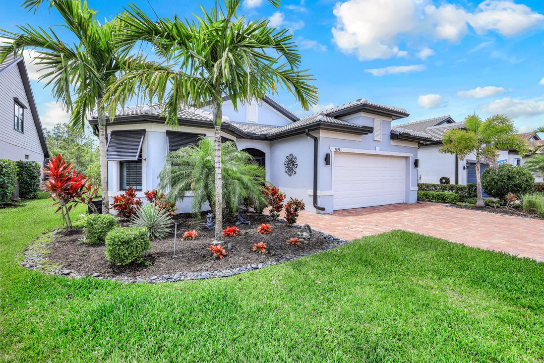 7692 Winding Cypress Dr, Naples, FL 34114