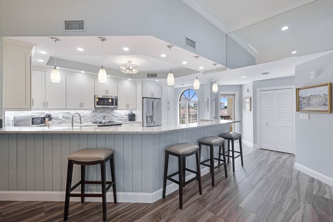 7048 Pelican Bay Blvd #305, Naples, FL 34108