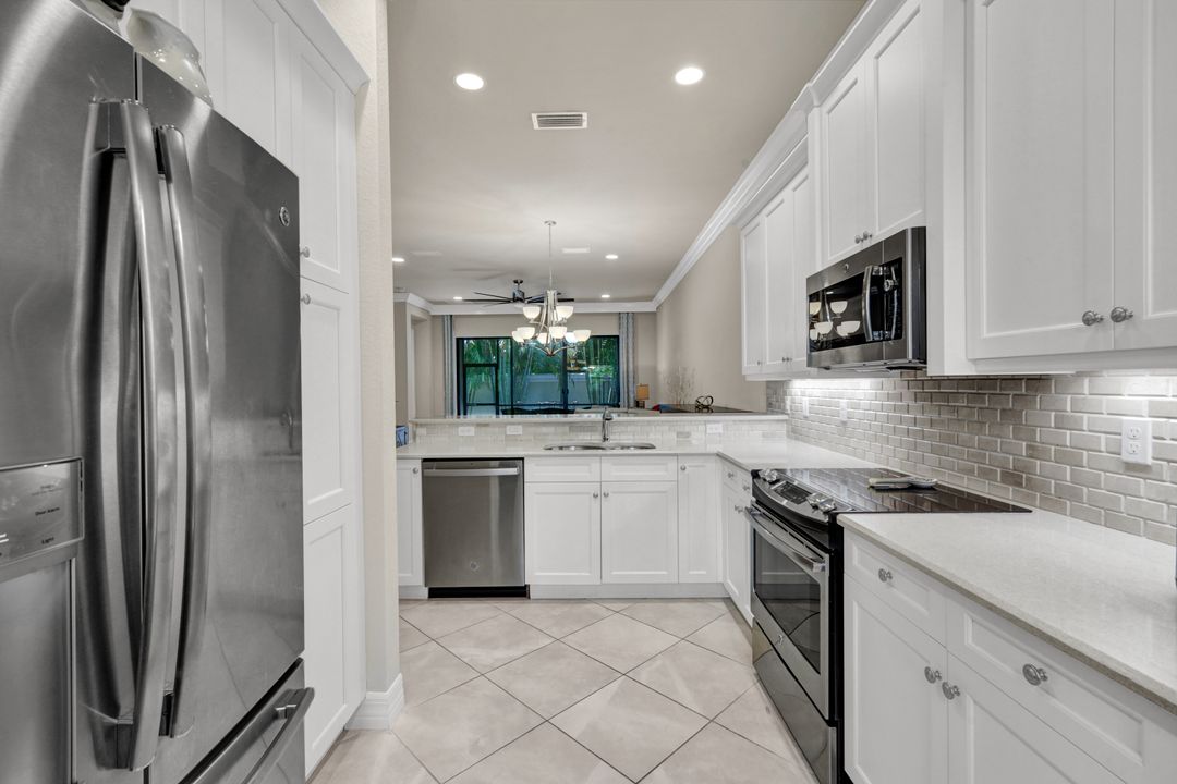 13423 Silktail Dr, Naples, FL 34109