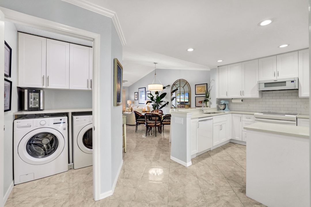 7742 Emerald Cir #V203, Naples, FL 34109