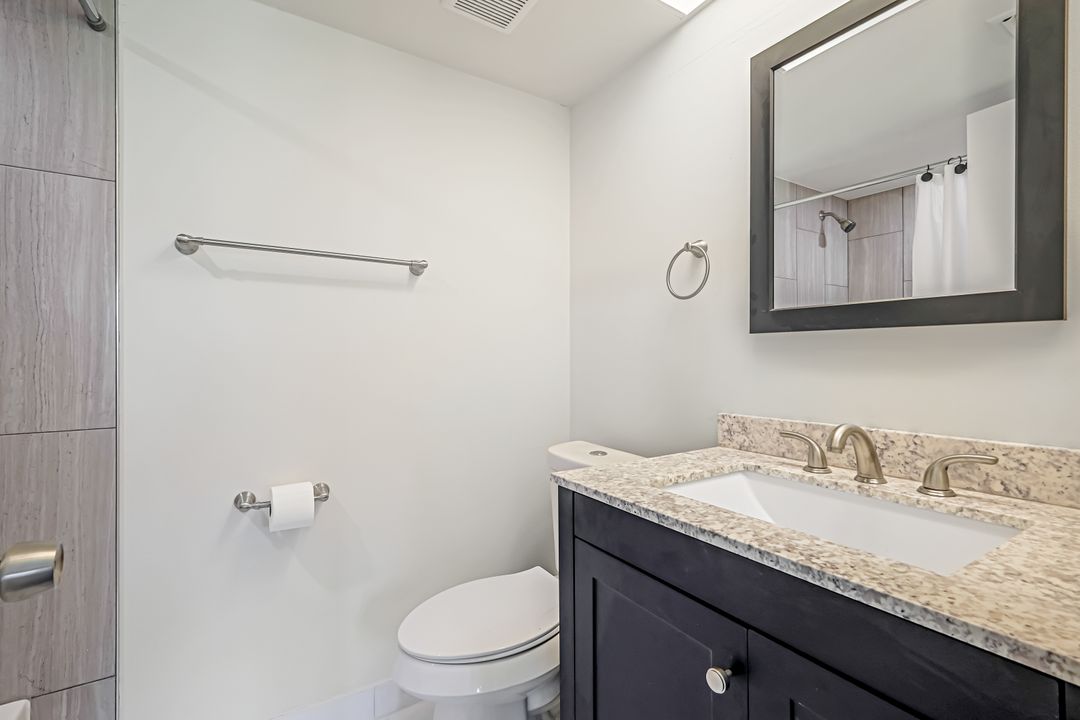 201 Quail Forest Blvd #202, Naples, FL 34105