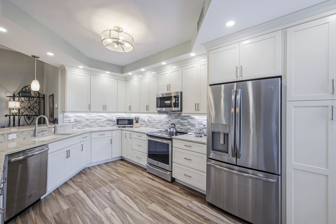 7048 Pelican Bay Blvd #305, Naples, FL 34108