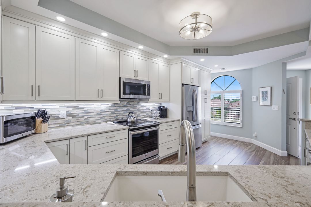 7048 Pelican Bay Blvd #305, Naples, FL 34108