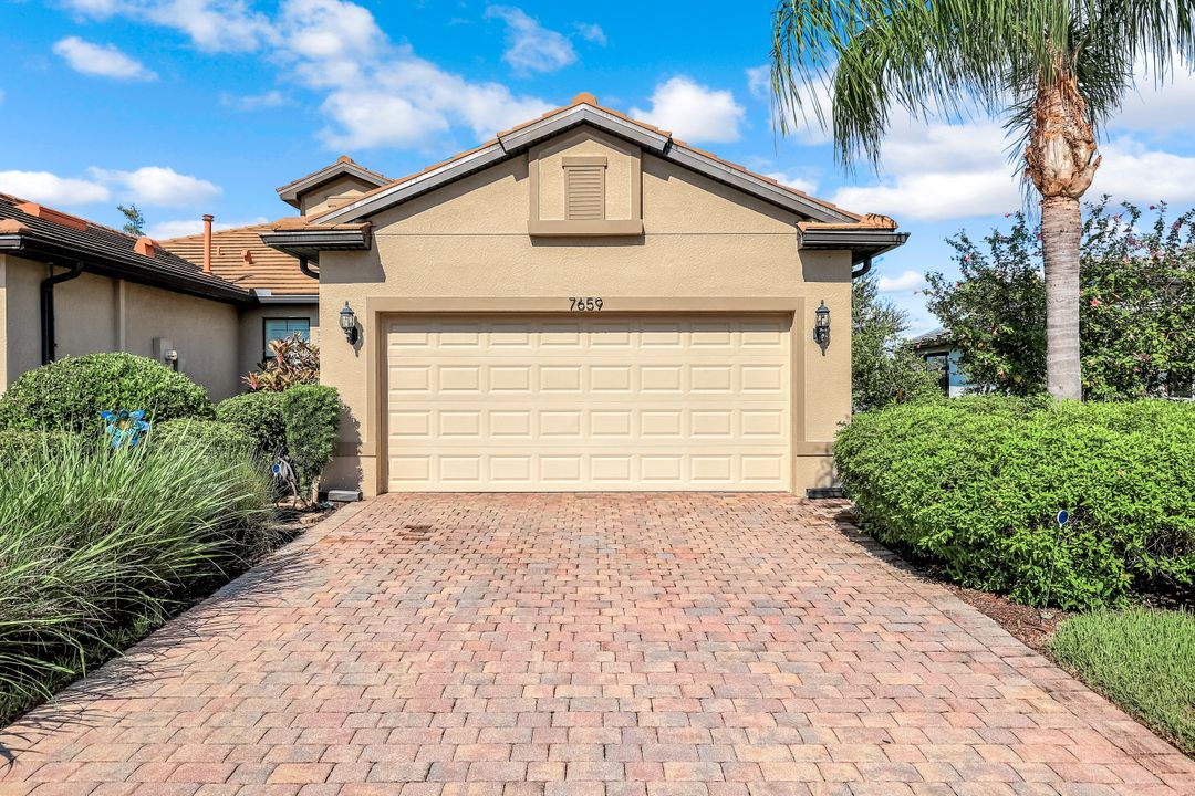 7659 Jacaranda Ln, Naples, FL 34114