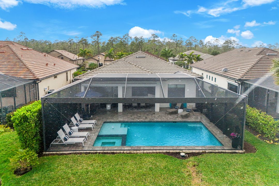 7631 Winding Cypress Dr, Naples, FL 34114