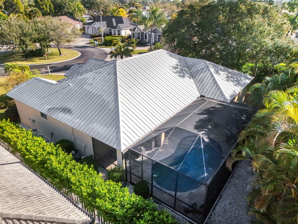 302 Sawgrass Ct, Naples, FL 34110