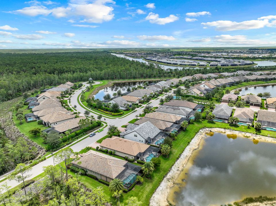 7408 Winding Cypress Dr, Naples, FL 34114