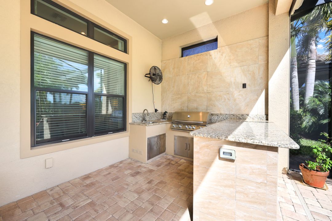 8678 Amour Ct, Naples, FL 34119