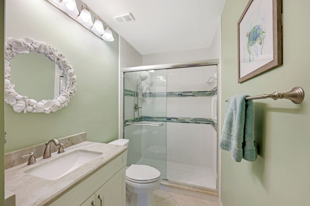 7048 Pelican Bay Blvd #C104, Naples, FL 34108
