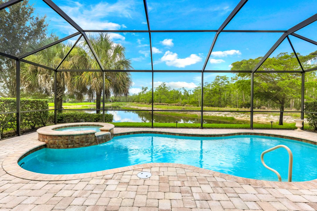 7408 Winding Cypress Dr, Naples, FL 34114