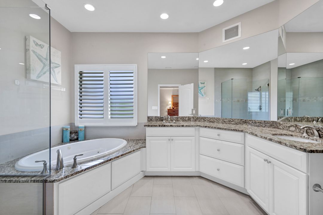 7056 Pelican Bay Blvd #201, Naples, FL 34108