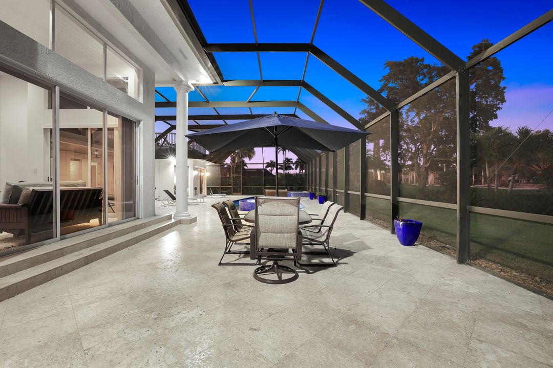 12924 Bald Cypress Ln, Naples, FL 34119