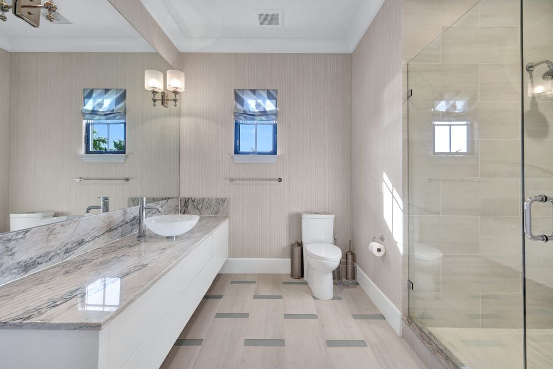 16988 Fairgrove Way, Naples, FL 34110