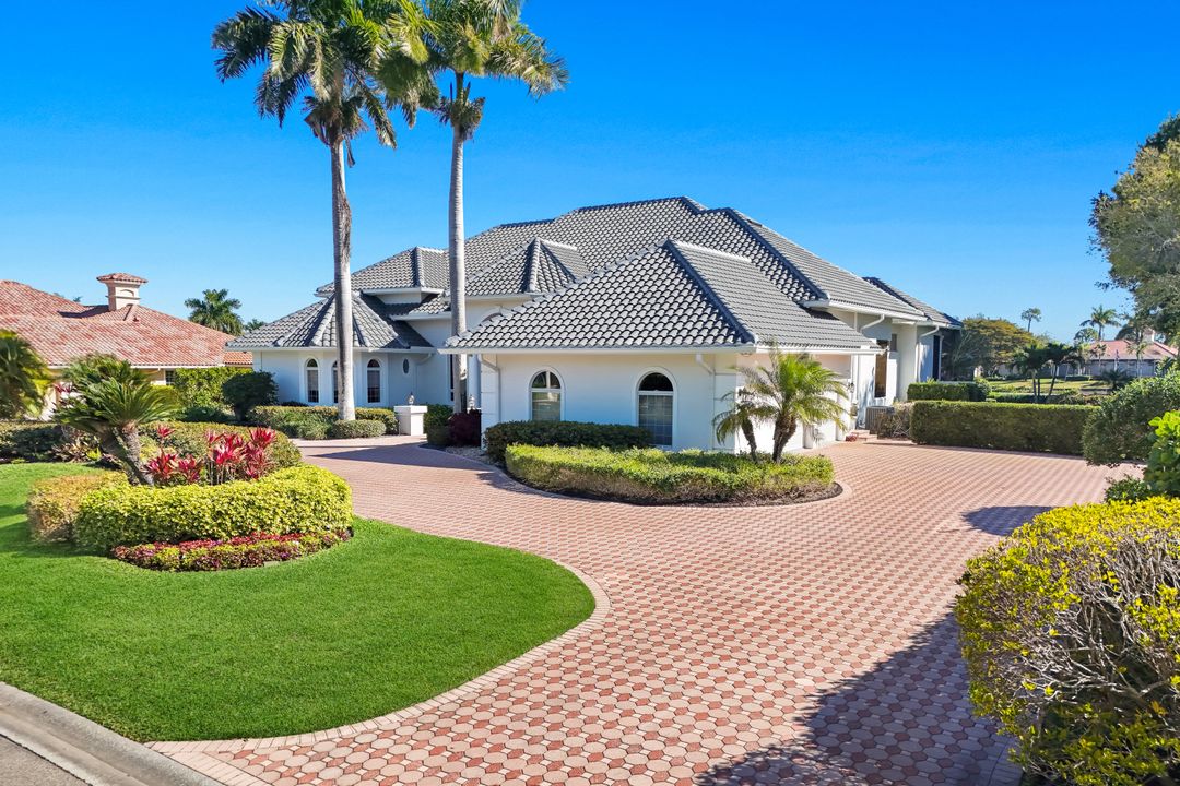 12924 Bald Cypress Ln, Naples, FL 34119