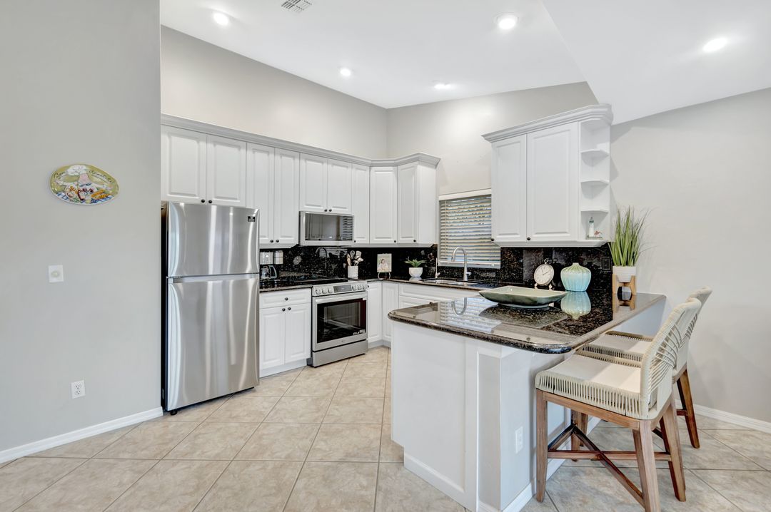10898 Longshore Way W, Naples, FL 34119
