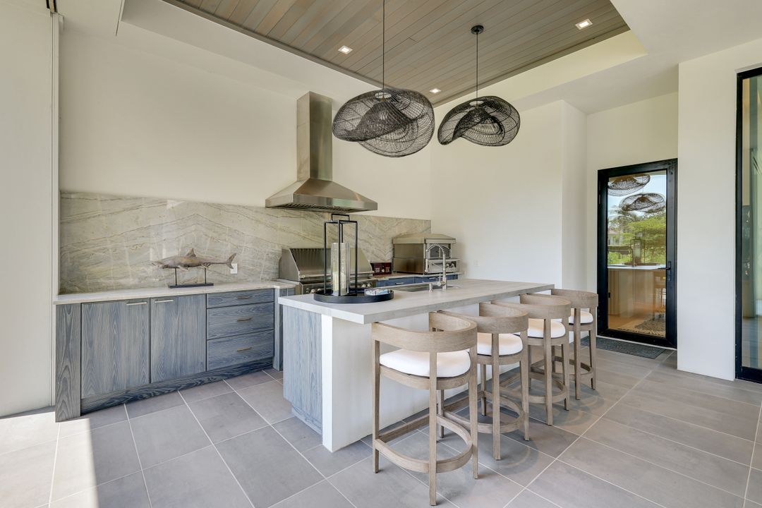 493 Carica Rd, Naples, FL 34108