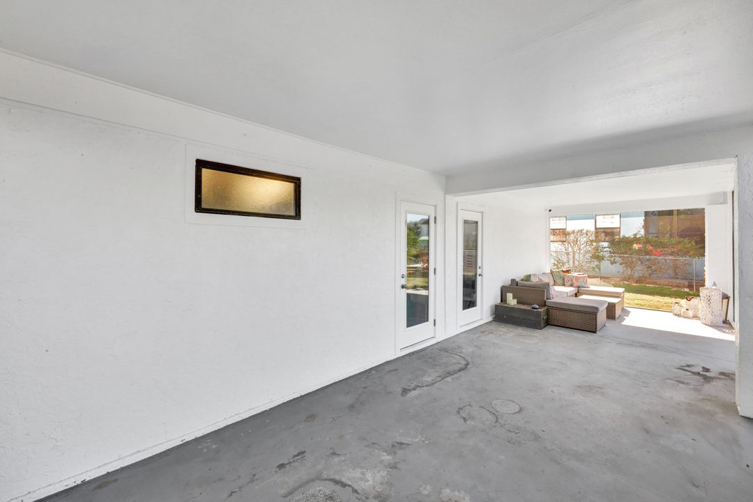 1285 Grand Canal Dr, Naples, FL 34110