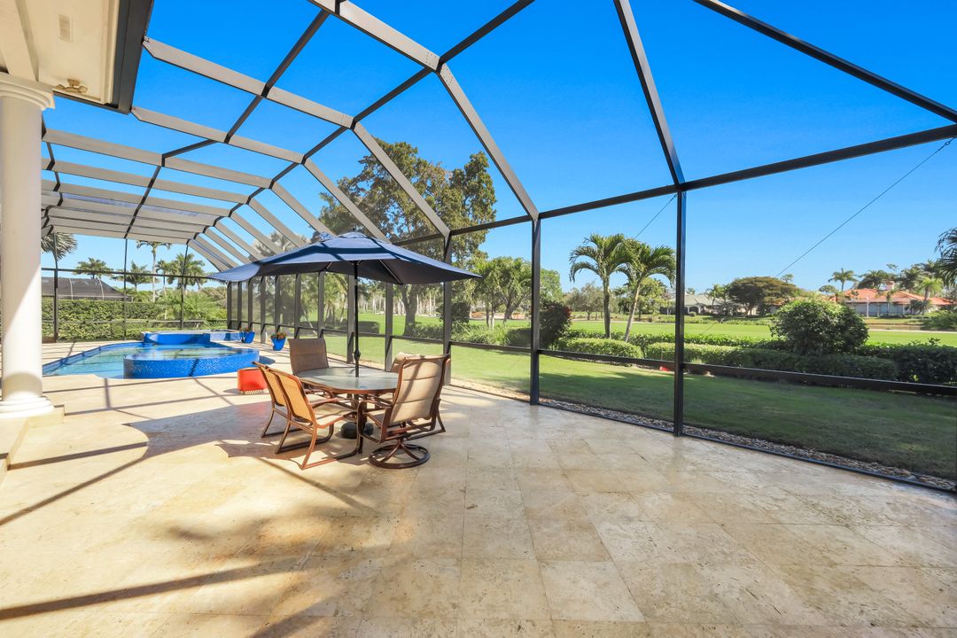 12924 Bald Cypress Ln, Naples, FL 34119