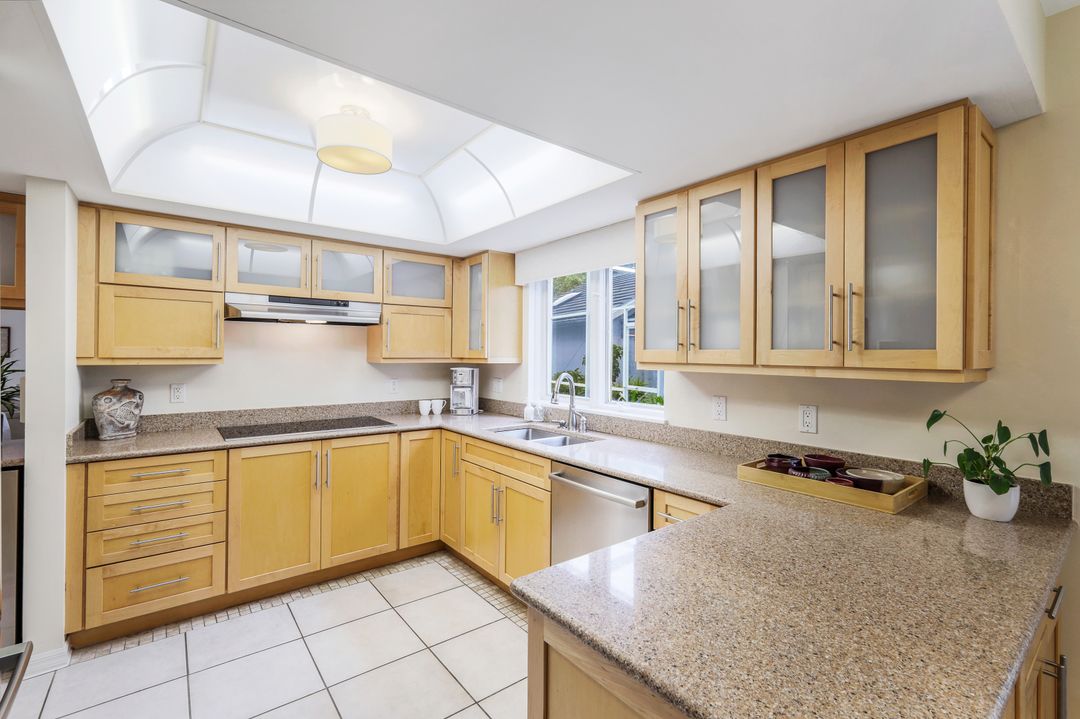 703 Heathery Ln, Naples, FL 34108