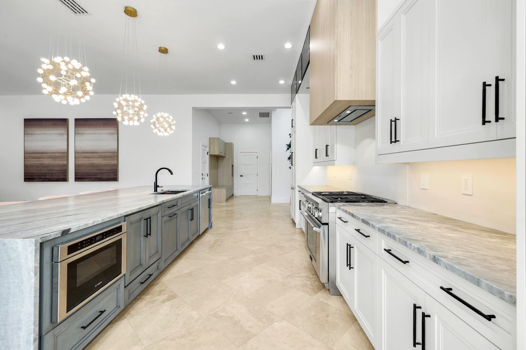 13087 Pond Apple Dr E, Naples, FL 34119