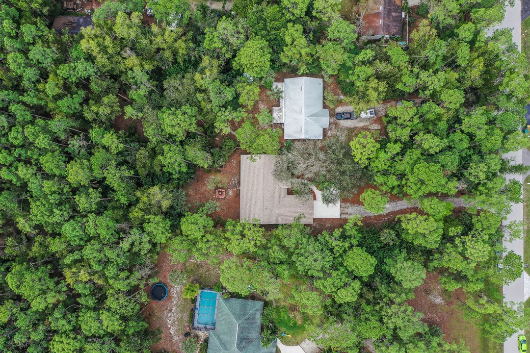 6030 English Oaks Ln, Naples, FL 34119