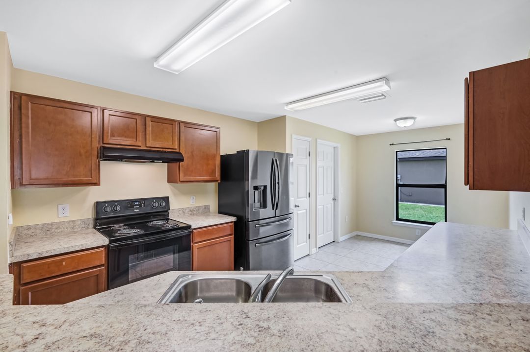 443 Shadow Lakes Dr, Lehigh Acres, FL 33974