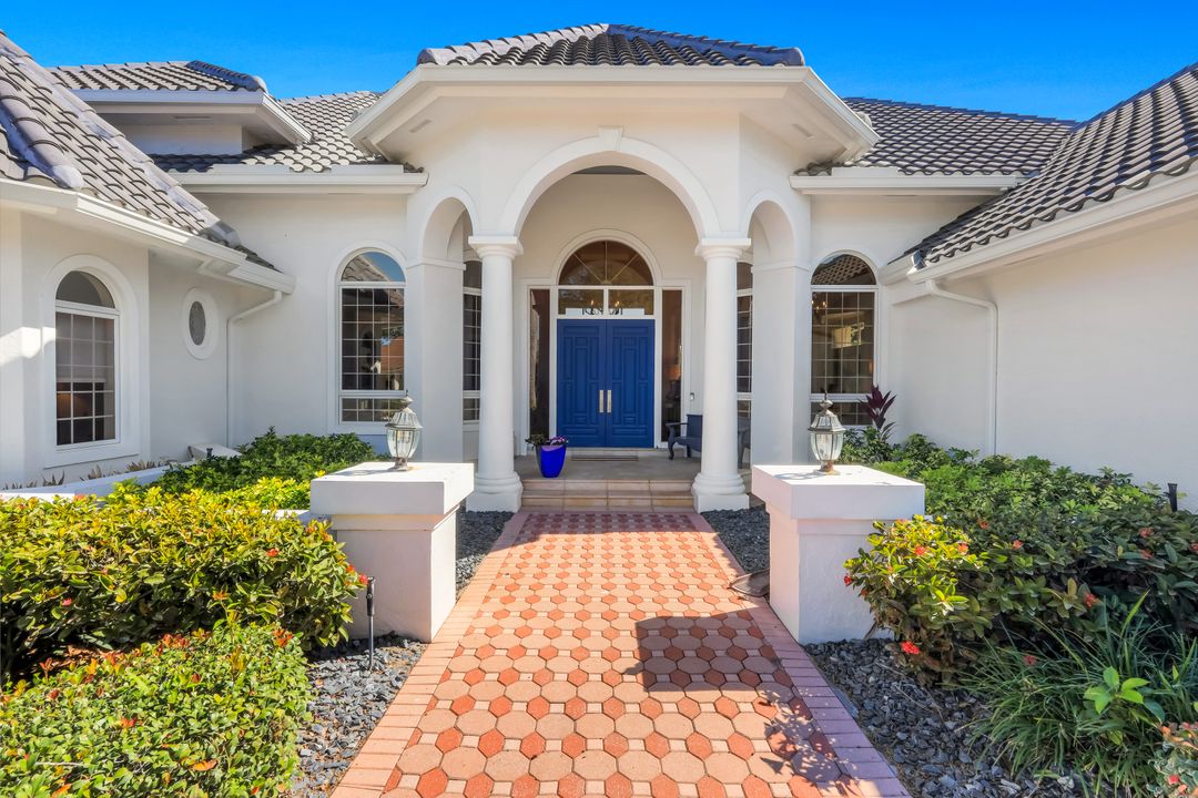 12924 Bald Cypress Ln, Naples, FL 34119