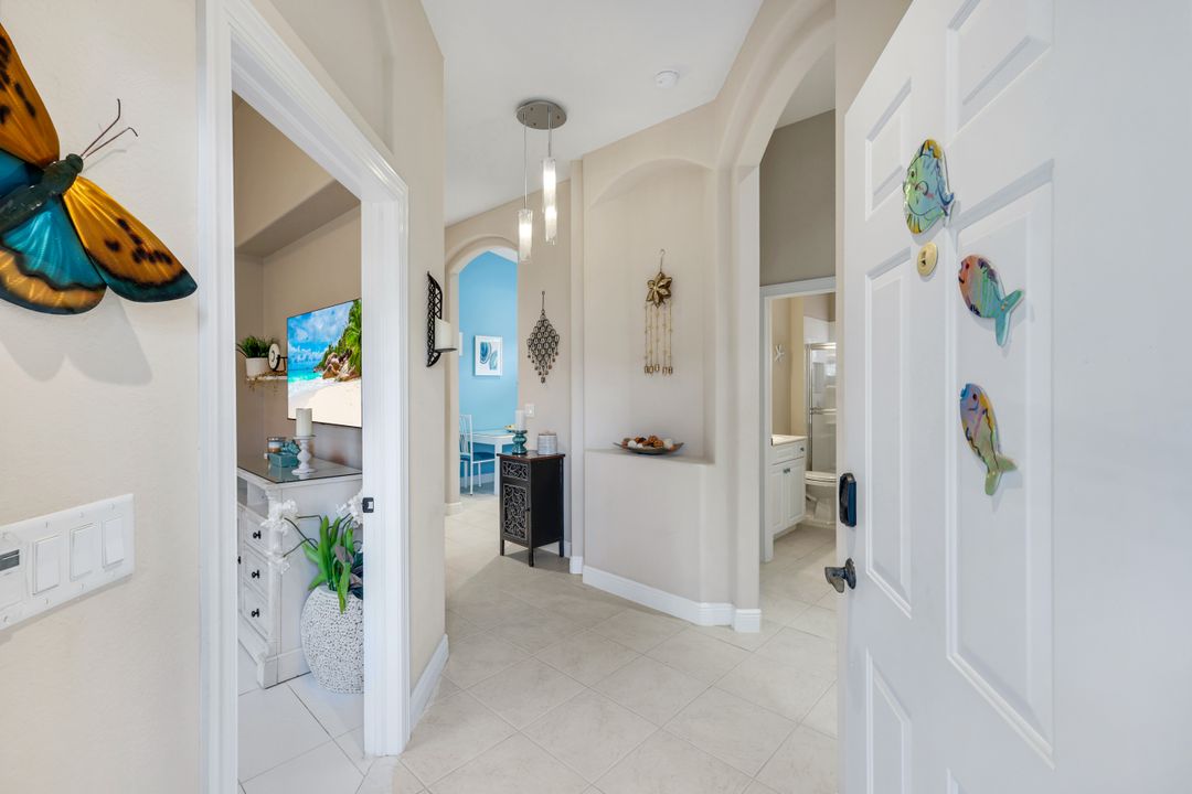 8683 Ibis Cove Cir, Naples, FL 34119