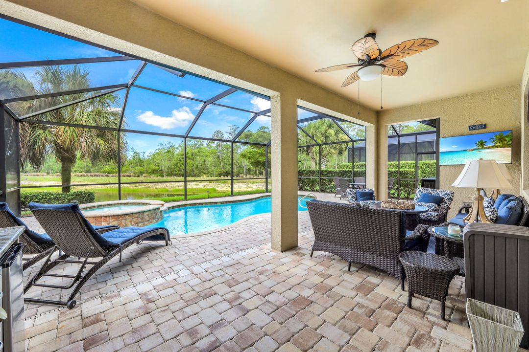 7408 Winding Cypress Dr, Naples, FL 34114