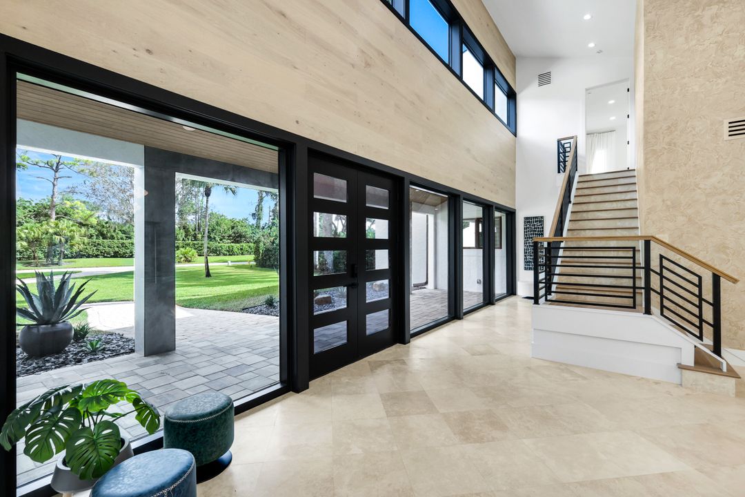 13087 Pond Apple Dr E, Naples, FL 34119