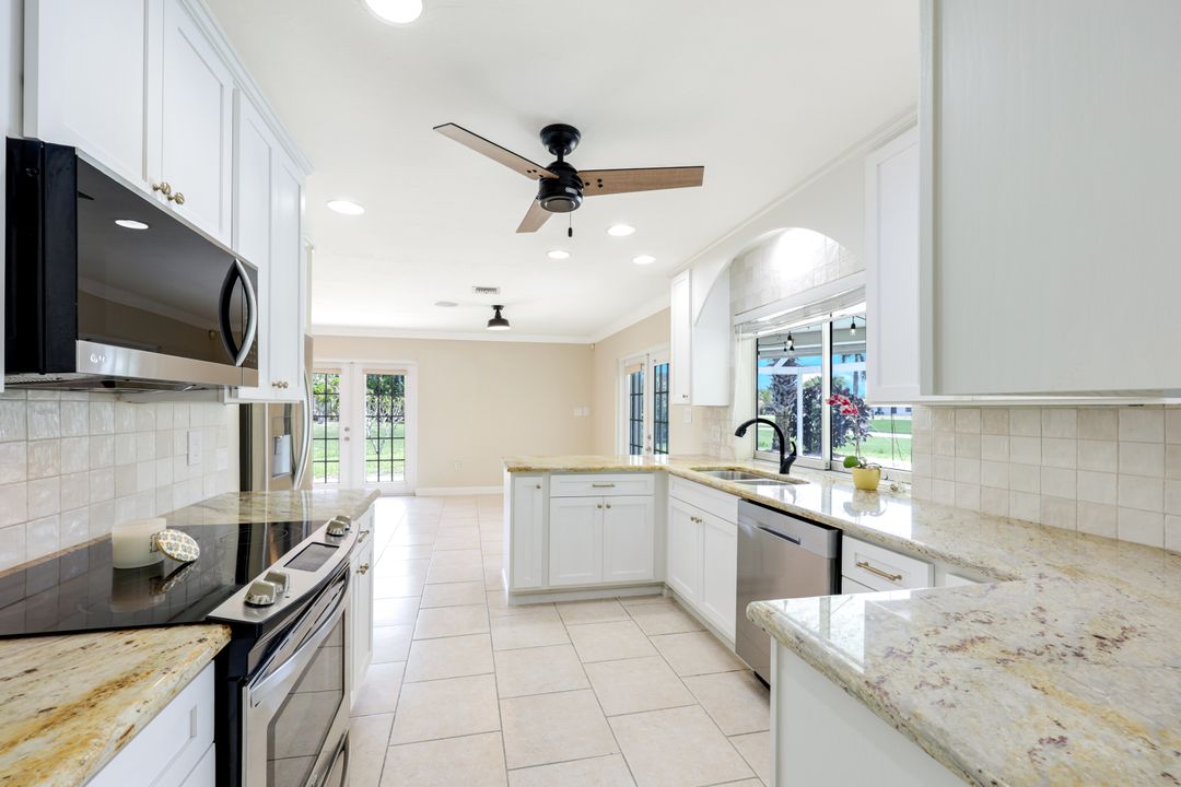 169 Baltusrol Dr, Naples, FL 34113