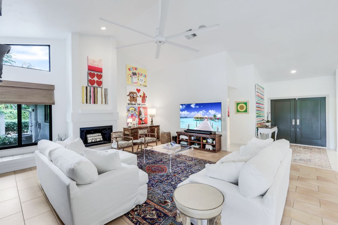 12975 Bald Cypress Ln, Naples, FL 34119