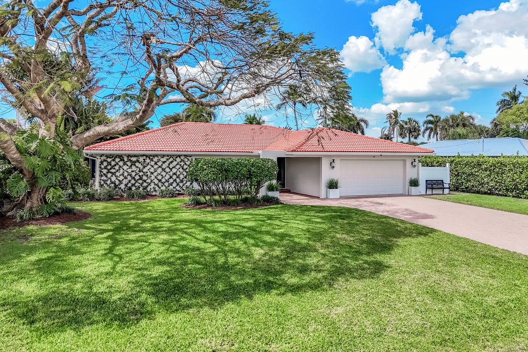 87 Burning Tree Dr, Naples, FL 34105