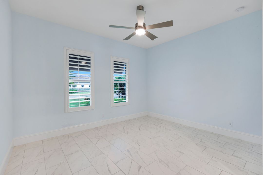 14386 Laguna Spgs Ln, Naples, FL 34114