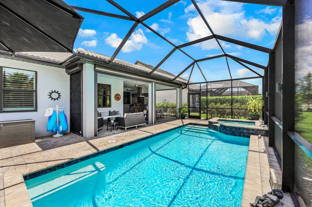7692 Winding Cypress Dr, Naples, FL 34114