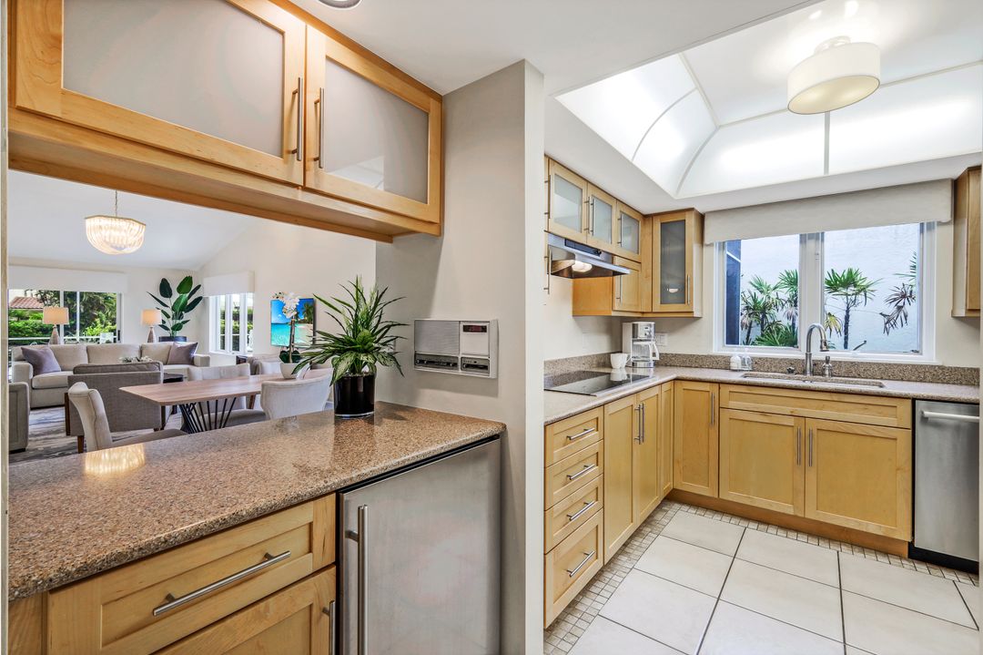 703 Heathery Ln, Naples, FL 34108