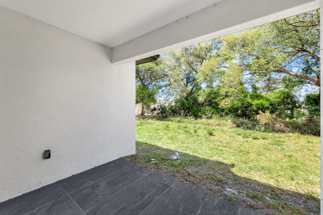 100 Parish Dr, Lehigh Acres, FL 33974