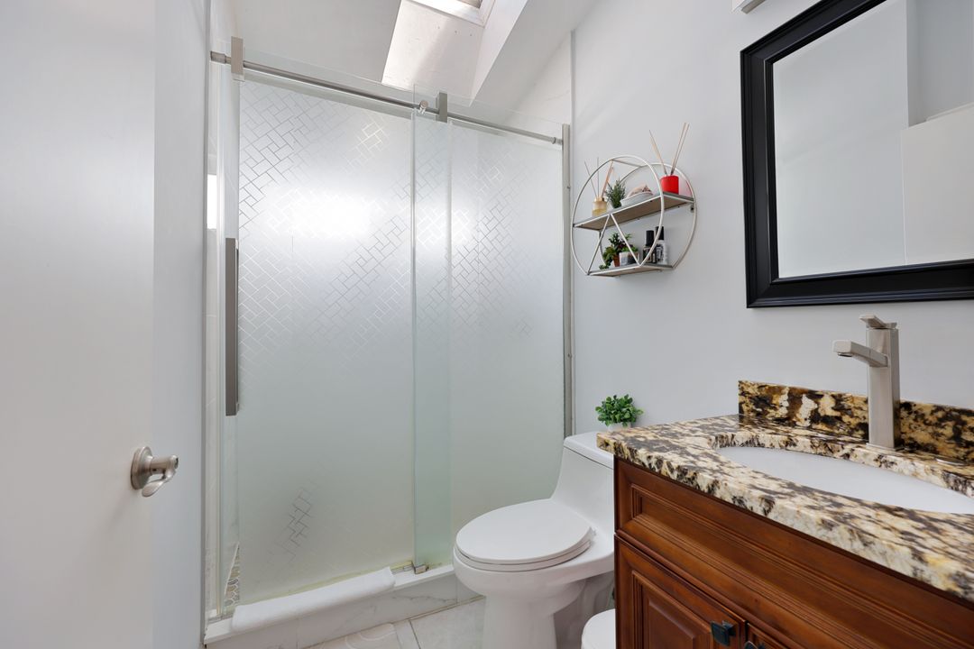 5018 Eclipse Ct, Naples, FL 34104