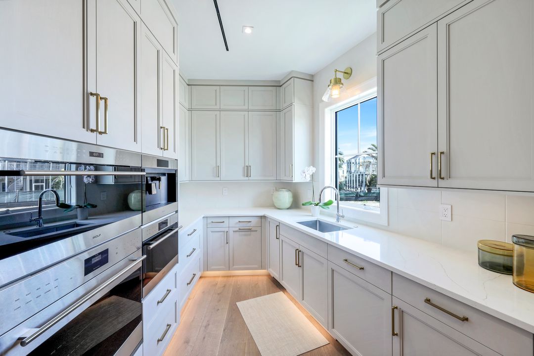 403 Neapolitan Way, Naples, FL 34103