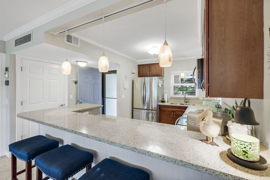 201 Quail Forest Blvd #101, Naples, FL 34105