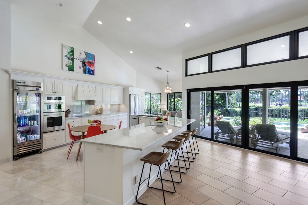 12975 Bald Cypress Ln, Naples, FL 34119